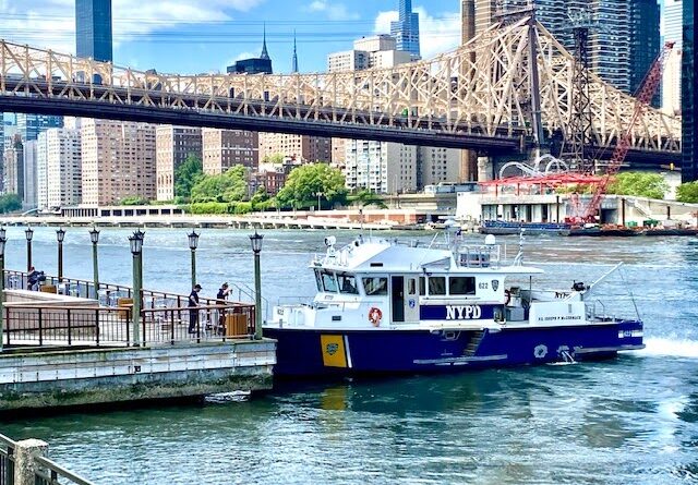 NYPD Harbor Unit Boat Makes East River Coffee Stop At Roosevelt Island Promenade Pier Today